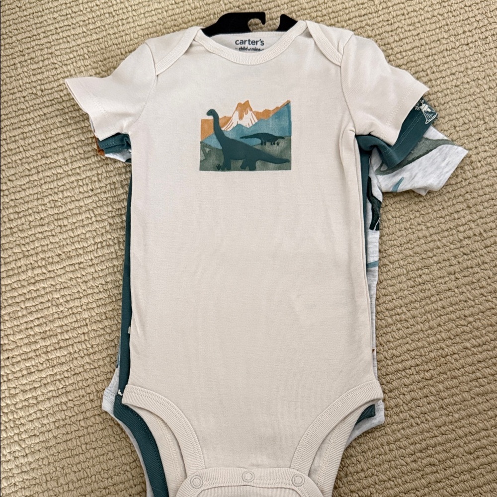 Carter's Cream One-Piece with Teal & Orange Dinosaur Graphic